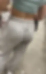 Fit Latina in grey sweats