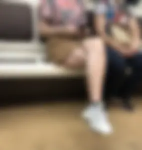 Amazing Hot Girl in a Skirt and Sneakers Sitting Cross-Legged in the Subway Train and on the Escalator Candid Photos Gallery