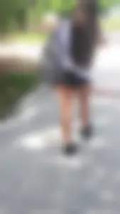 Brunette babes cheeks in tiny shorts walking