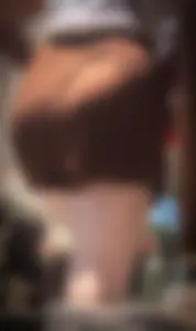 Street closeup creepshot of a booty in shorts