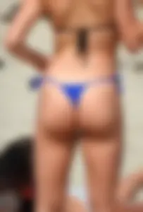 Hot ass brunette on the beach in blue thong with amazing body