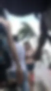 Sexy Girl in Denim Shorts and Swimsuit Street Creepshot Series