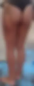 Beach shower milf in semi thong bikini with a nice ass