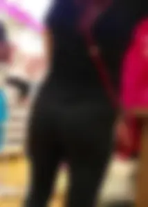 Mature sexy lady in Pink leggings shopping at Pink