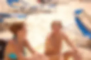 Assortment of sexy babes at the beach in bikinis