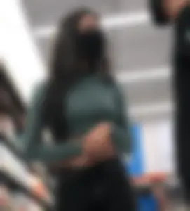 Tight green top and blk jeans at the market