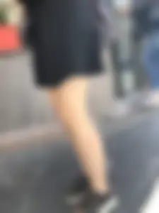 Very nice legs of a candid girl wearing a skirt