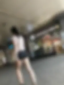 Awesome candid chick wearing mini shorts, perfect long pale legs