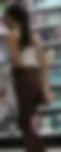 Slim latina in light brown leggings