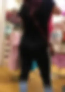 Mature sexy lady in Pink leggings shopping at Pink