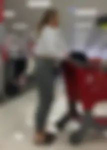 Sexy lady shopping at Target with a big ass in grey leggings