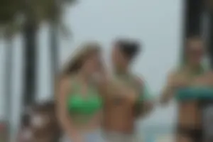Saint Patrick's Day girls in bikinis at Deerfield Beach in Florida