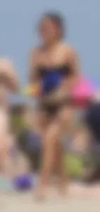 Two thick white girls in bikinis on the beach with big asses