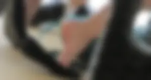Female Feet With Flats Taken Off Under Table - Photos From College Classroom