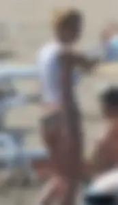 A bunch of sexy beach voyeur babes in bikinis, thongs and topless