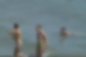 Girls on a nude beach in Sitges, Spain