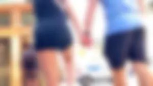 Perfect ass in spandex shorts and hot thighs closeups at the crosswalk on the street creepshots
