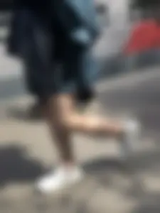 Cute candid girl in a dress at the train station