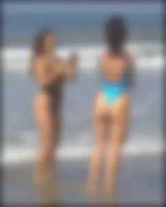 Sexy ass beach babe in a yellow thong swimsuit