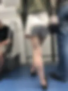 Subway train and subway station creepshots of a candid girl wearing shorts with pale skinny legs