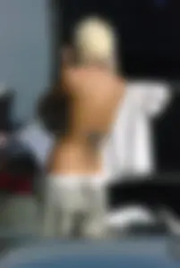 Blonde babe changing into and out of bikini and shows her tits