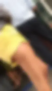 Skinny ass eating her yellow shorts