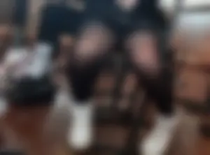 A college candid girl wearing a mini-skirt, black pantyhose and sneakers accidentally flashing her panties in classroom while sitting at her desk creepshot