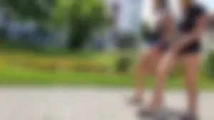 Hot Candid Girls in Shorts And Slippers Walking Down the Suburban Street