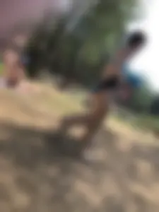 Wet Girls in Swimsuits Walking Towards Water at a Lake Beach Photo Series