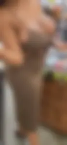Huge titted ebony bimbo lets me admire her fun bags