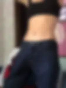 Skinny girl showing off her tummy selfies