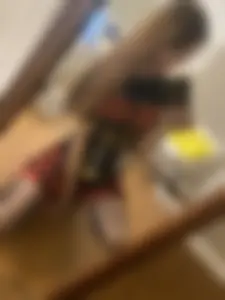 Very Skinny Girl in Skirt and Pantyhose Making Selfie is the Mirror