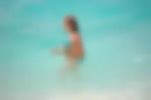 Assortment of sexy babes at the beach in bikinis