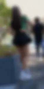 Petite woman in short miniskirt, pretty cheeks and beautiful face [oc]