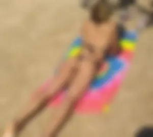 Thong girl on the beach with a great ass