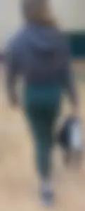 Tiny Asian leaving the gym in green leggings