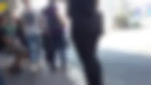 Sexy ass in leggings waiting for the bus