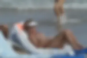 Girls on a nude beach in Sitges, Spain