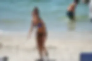 Sexy ass girl with a perfect body in her bikini on the beach