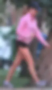 Beautiful skinny girl out for a walk in little shorts