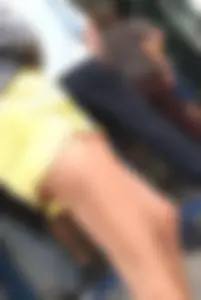 Skinny ass eating her yellow shorts