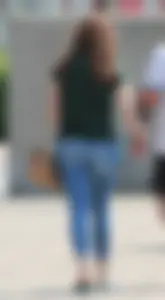 Redhead booty walking in tight jeans