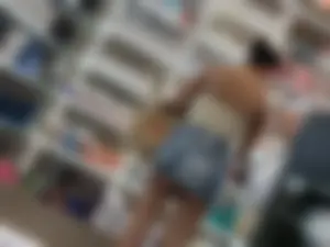 Extremely Hot Latina in Mini Skirt Showing Big Cheeks