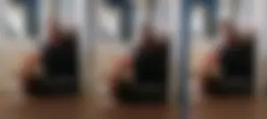 Hot girl sitting with crossed legs in a subway train: hot muscly legs