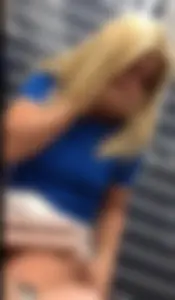 Blonde lady with big boobs showing pokies