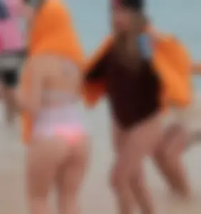 Couple PAWGs on the beach in bikinis partying