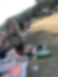 Pale Skinny Girl Lying on the Beach in Swimsuit With Crossed Legs Candid Gallery