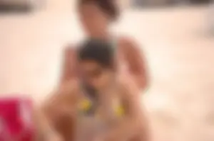 Assortment of sexy babes at the beach in bikinis