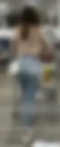 Tight plump college girl ass in jeans with a small wedge