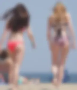 Group of sexy girls on the beach in bikinis with nice bodies